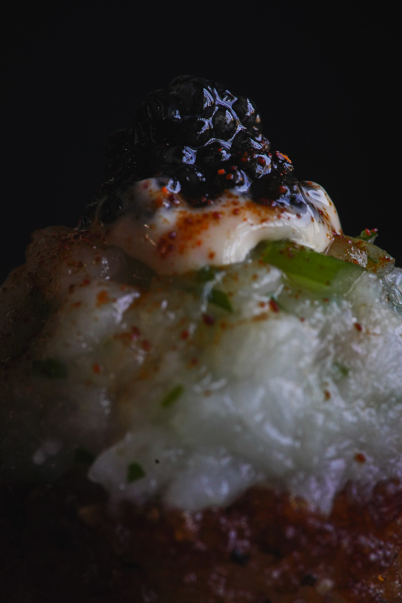 Caviar and artisan bite served at the Chef's Table pop-up dinner at Cloak & Petal